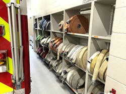 Maximizing hose storage capacity was a goal of the design of the new firehouse for the Fort Atkinson, WI, Fire Department. Spacesaver custom-manufactured a shelving solution that delivered on that need as well as increasing the ease by which members access hose. Maximizing hose storage capacity was a goal of the design of the new firehouse for the Fort Atkinson, WI, Fire Department. Spacesaver custom-manufactured a shelving solution that delivered on that need as well as increasing the ease by which members access hose.