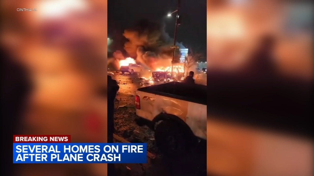 Burning cars, debris litter street after Philadelphia plane crash at Roosevelt Mall