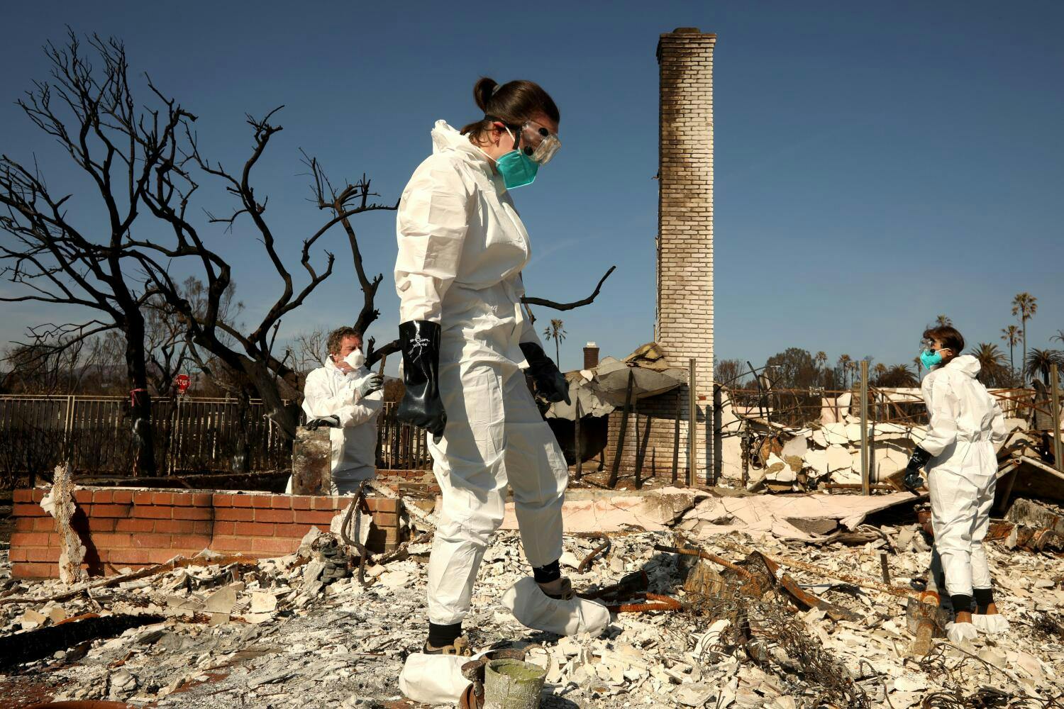 Jenna Zweig, center, and her parents Stefan, left, and Judy Zweig found out that someone else had applied for FEMA assistance after stealing their personal information.