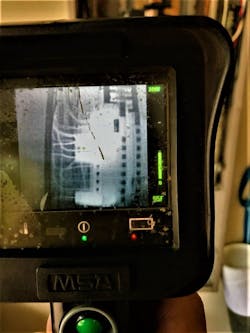 A thermal imaging camera (TIC) identifies a 220-watt superheated fuse from an air conditioner air handler. A thermal imaging camera (TIC) identifies a 220-watt superheated fuse from an air conditioner air handler.