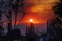 A smoky haze fills the dusk landscape as a home smolders in the foreground during the Eaton fire in Altadena on Jan. 8. A smoky haze fills the dusk landscape as a home smolders in the foreground during the Eaton fire in Altadena on Jan. 8.