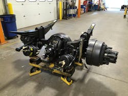 Suspension and brake components are attached to this single-rear-axle assembly, making it ready for installation on the vehicle chassis. Suspension and brake components are attached to this single-rear-axle assembly, making it ready for installation on the vehicle chassis.
