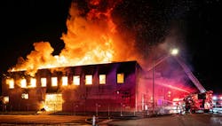 When Fort Worth Fire Department crews arrived, heavy fire showed from the first and second floors of a vacant building. Firefighters knew the building well, so operations went defensive almost immediately. When Fort Worth Fire Department crews arrived, heavy fire showed from the first and second floors of a vacant building. Firefighters knew the building well, so operations went defensive almost immediately.