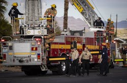 Las Vegas police and firefighters, with assistance from Clark County Fire Department, respond to the scene of an unconscious man who passed away while stuck in a palm tree on Bonanza Road near 21st Street on Wednesday, Feb. 12, 2025, in Las Vegas. Las Vegas police and firefighters, with assistance from Clark County Fire Department, respond to the scene of an unconscious man who passed away while stuck in a palm tree on Bonanza Road near 21st Street on Wednesday, Feb. 12, 2025, in Las Vegas.