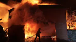Malibu, California January 8, 2025-A firefighter battles a house fire along PCH as the Palisades Fire burns in Malibu Wednesday.