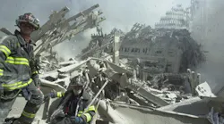 Firefighters search through rubble of the World Trade Center towers on Sept. 11.
