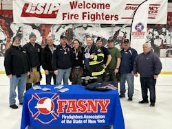 The awards ceremony was held on the ice following the broomball competition. The awards ceremony was held on the ice following the broomball competition.