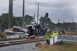 A Delray Beach ladder truck was hit by a train when the driver drove around the gates. A Delray Beach ladder truck was hit by a train when the driver drove around the gates.