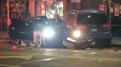 Driver killed, another in police custody after crash in Queens
