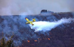 A Super Scooper makes a drop on the Palisades Fire in Mandeville Canyon, which is in the Brentwood section of West Los Angeles. A Super Scooper makes a drop on the Palisades Fire in Mandeville Canyon, which is in the Brentwood section of West Los Angeles.