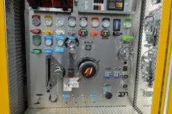 The pump panel on the OWL Fire Department’s Engine 502B shows the standard color coding and labeling for each discharge. Note the handwheel crank control for the tank to pump line and intake valve controls for the front, rear and right-side valves at the lower portion of the panel. The pump panel on the OWL Fire Department’s Engine 502B shows the standard color coding and labeling for each discharge. Note the handwheel crank control for the tank to pump line and intake valve controls for the front, rear and right-side valves at the lower portion of the panel.