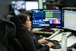 A dispatcher in the DeKalb County 9-1-1 center logs a call into the computer. A dispatcher in the DeKalb County 9-1-1 center logs a call into the computer.