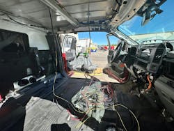 A Wheeled Coach ambulance in the production process where wires are being run throughout the vehicle. A Wheeled Coach ambulance in the production process where wires are being run throughout the vehicle.