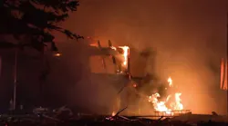 Crews putting out fire at apparent home explosion in Wayne County