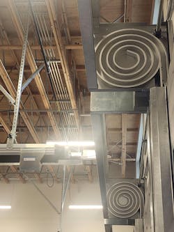 The doors are springless and use a roller chain instead of a strap, which helps them to live up to their 500,000-cycle warranty. The doors are springless and use a roller chain instead of a strap, which helps them to live up to their 500,000-cycle warranty.