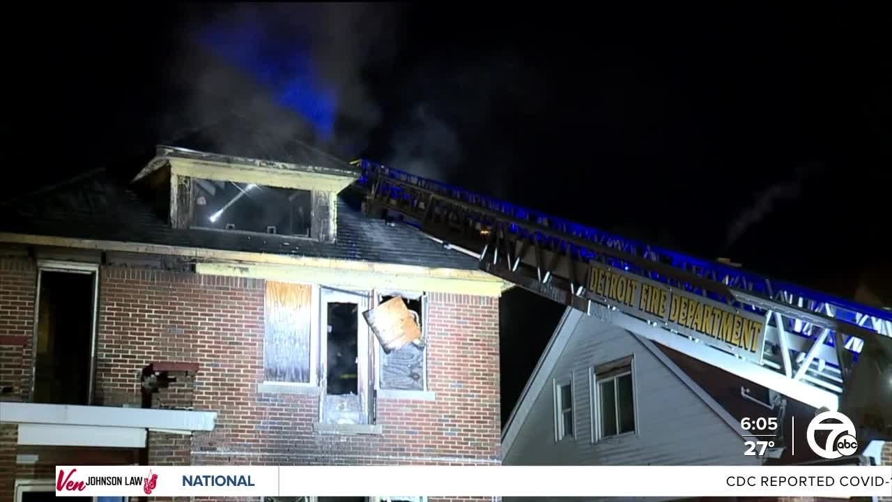Detroit firefighter hospitalized after falling through floor while battling house fire