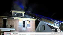 Detroit firefighter hospitalized after falling through floor while battling house fire