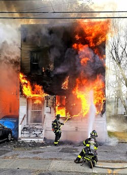 Members of the Albany, NY, Fire Department responded for a reported structure fire with occupants jumping from the structure. First-arriving units found a vacant building well involved, with fire rapidly extending into the B-side exposure. A second alarm was transmitted. Multiple lines were deployed, and a search of the original fire building was initiated. Companies contended with high winds, bitterly cold temperatures and burning overhead live electrical wires. Approximately 50 firefighters and 13 apparatus were on scene. A squatter who jumped from the vacant building wasn’t located. Members of the Albany, NY, Fire Department responded for a reported structure fire with occupants jumping from the structure. First-arriving units found a vacant building well involved, with fire rapidly extending into the B-side exposure. A second alarm was transmitted. Multiple lines were deployed, and a search of the original fire building was initiated. Companies contended with high winds, bitterly cold temperatures and burning overhead live electrical wires. Approximately 50 firefighters and 13 apparatus were on scene. A squatter who jumped from the vacant building wasn’t located.