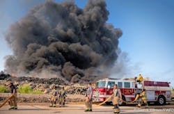 Firefighters from multiple department establish a water supply at the Fort Worth fire Sunday. Firefighters from multiple department establish a water supply at the Fort Worth fire Sunday.