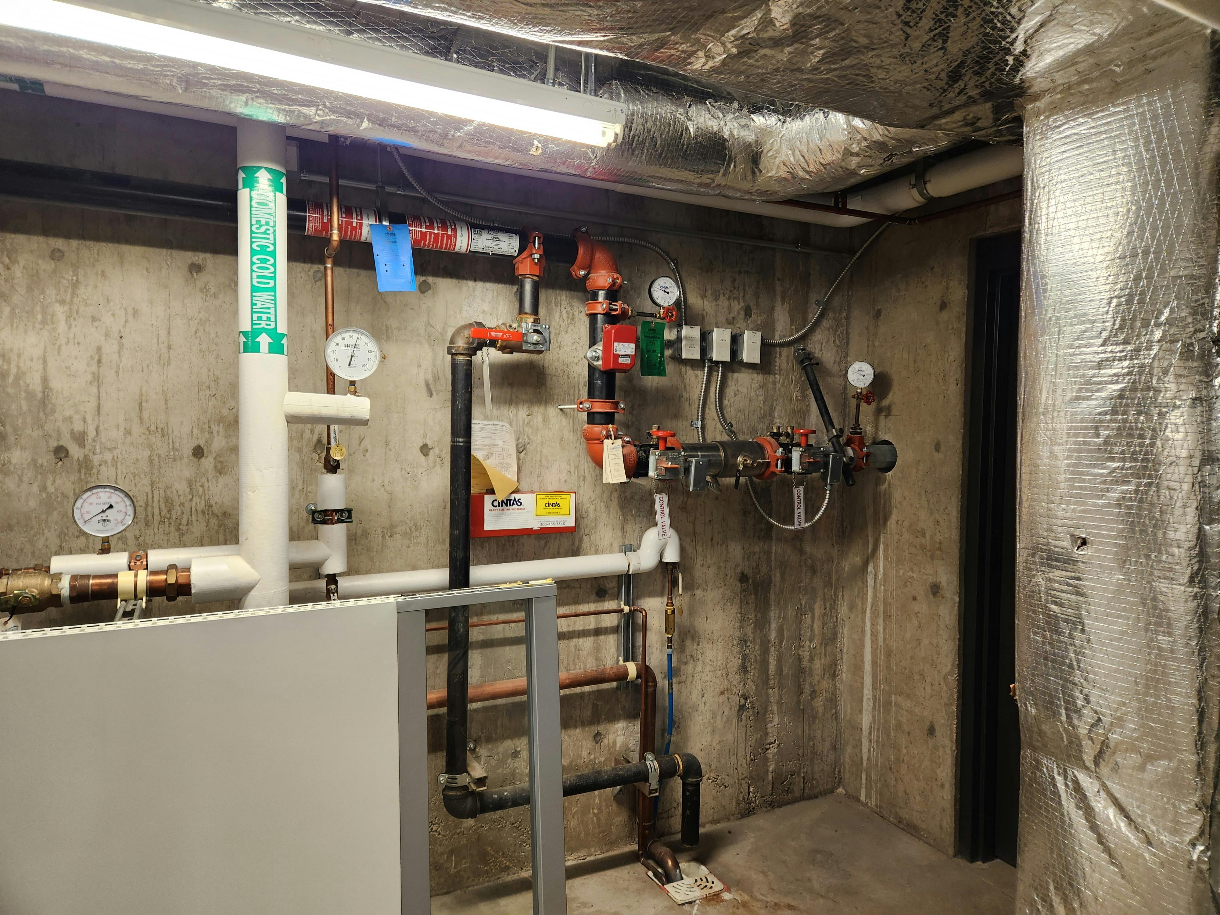 A commercial system fire sprinkler riser within a mixed-use occupancy.