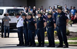 Chicago firefighters wait as an escort arrives with Capt. David Meyer at Malec & Sons Funeral Home. Chicago firefighters wait as an escort arrives with Capt. David Meyer at Malec & Sons Funeral Home.