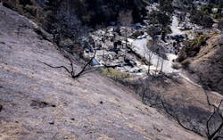 Houses and other structures were destroyed by the raging wildfire in January. Houses and other structures were destroyed by the raging wildfire in January.