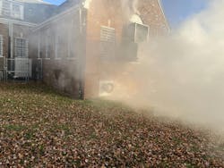 Initial-arriving crews must make a complete assessment of conditions of the entire incident, not just the front. Here, the bars that are on the windows immediately require another alarm to the assignment to deal with that hazard. Initial-arriving crews must make a complete assessment of conditions of the entire incident, not just the front. Here, the bars that are on the windows immediately require another alarm to the assignment to deal with that hazard.