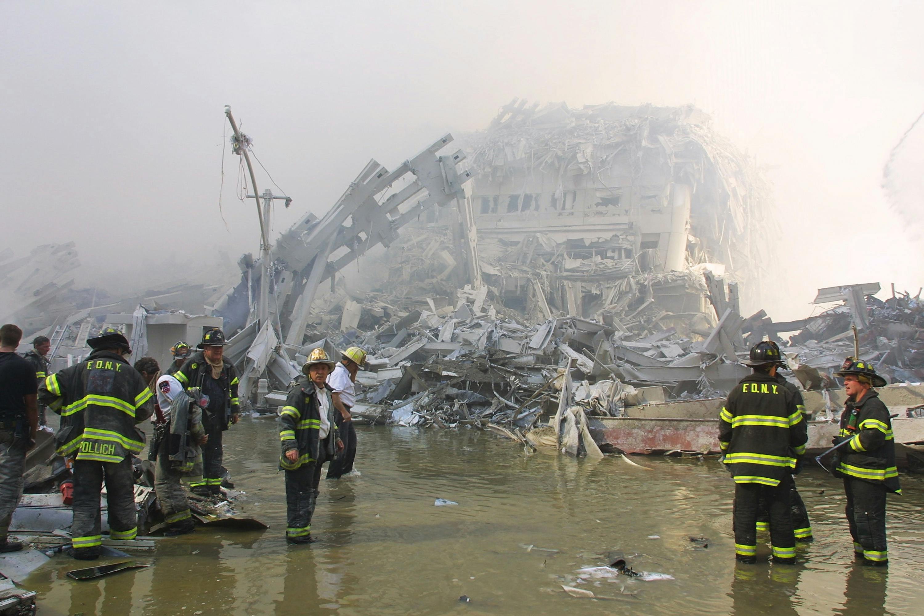 FDNY firefighters work at the World Trade Center on Sept. 11, 2001.