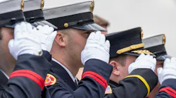 Colleagues salute Kansas City Paramedic Graham Hoffman.