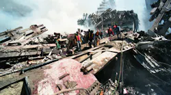 FDNY firefighters search the ruins of the World Trade Center.