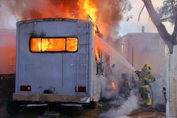 Following numerous calls that reported a vehicle on fire in a yard, Drexel Heights Fire District Battalion 415 arrived and immediately upgraded the fire to a structure fire because of the heavy fire load that was around a recreational vehicle. When crews from Engine 423 arrived, members stretched a 1¾-inch handline to extinguish the blaze. Additional crews arrived to assist with the extensive overhaul that was needed because of the amount of trash that was on scene. Following numerous calls that reported a vehicle on fire in a yard, Drexel Heights Fire District Battalion 415 arrived and immediately upgraded the fire to a structure fire because of the heavy fire load that was around a recreational vehicle. When crews from Engine 423 arrived, members stretched a 1¾-inch handline to extinguish the blaze. Additional crews arrived to assist with the extensive overhaul that was needed because of the amount of trash that was on scene.