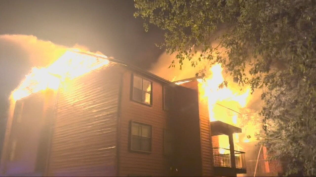 Fire engulfs Northeast Side apartments as 100 firefighters battle two-alarm blaze
