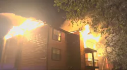Fire engulfs Northeast Side apartments as 100 firefighters battle two-alarm blaze