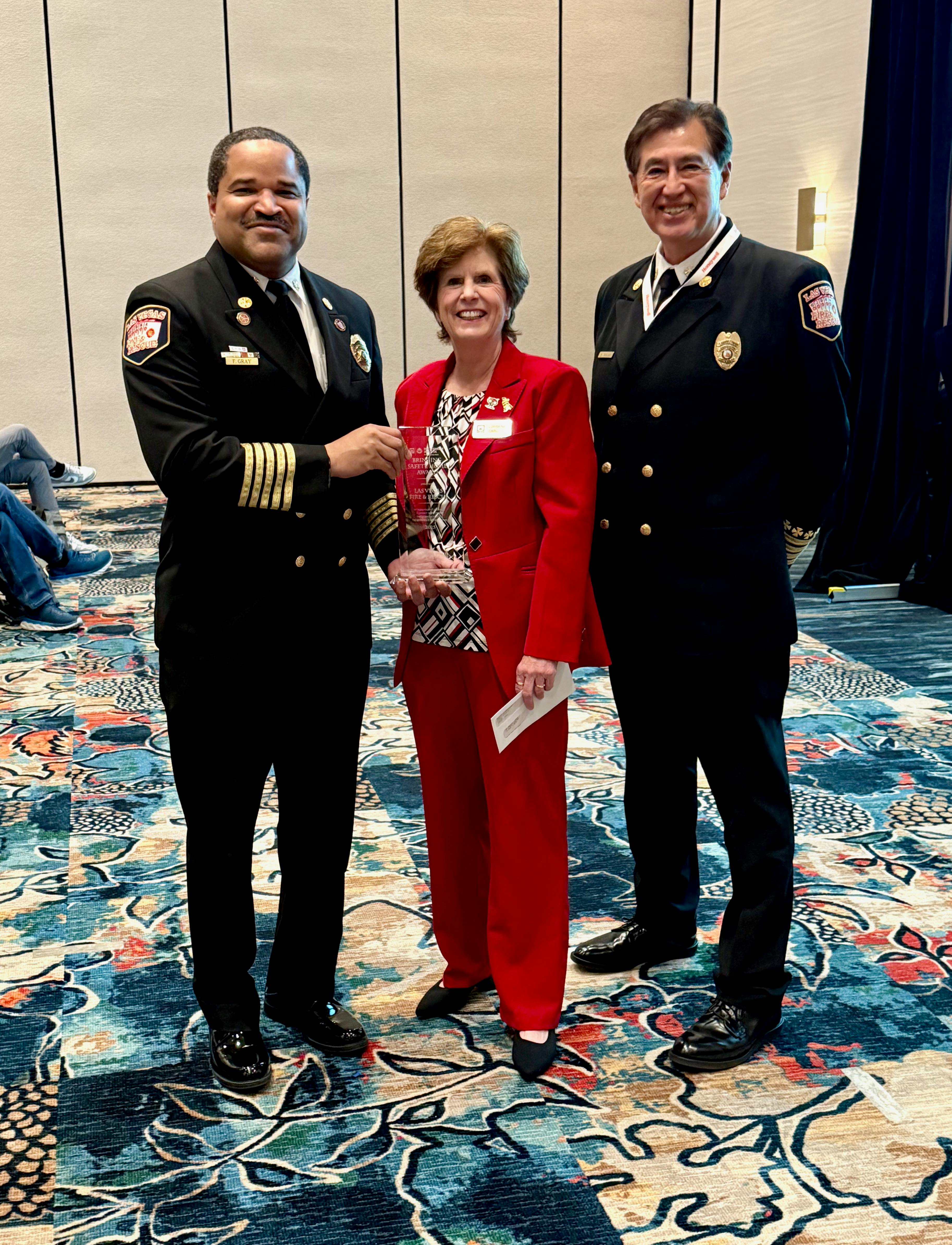 Left to Right: Fire Chief Fernando Gray, Las Vegas Fire & Rescue; Lorraine Carli, NFPA Vice President of Outreach and Advocacy and HFSC President; and Sr. Deputy Fire Chief Robert Nolan, Las Vegas Fire & Rescue.