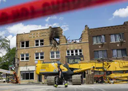 Firefighters work at the scene of a fire that claimed the lives of four people in Chicago's Austin neighborhood on June 26. Firefighters work at the scene of a fire that claimed the lives of four people in Chicago's Austin neighborhood on June 26.