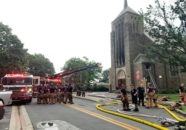 Baltimore County firefighters battled a church fire in Dundalk after a storm Tuesday.
