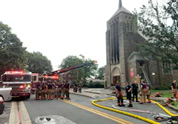 Baltimore County firefighters battled a church fire in Dundalk after a storm Tuesday.