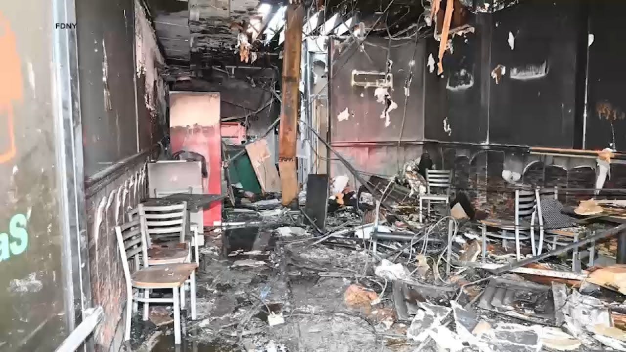 Woman killed in Queens pizza shop fire was trapped inside bathroom when e-bike burst into flames