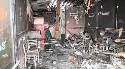 Woman killed in Queens pizza shop fire was trapped inside bathroom when e-bike burst into flames