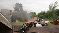 Firefighters familiarize themselves with the positioning and performance of Ziamatic's under-the-vehicle Vehicle Cooling Unit. Firefighters familiarize themselves with the positioning and performance of Ziamatic's under-the-vehicle Vehicle Cooling Unit.