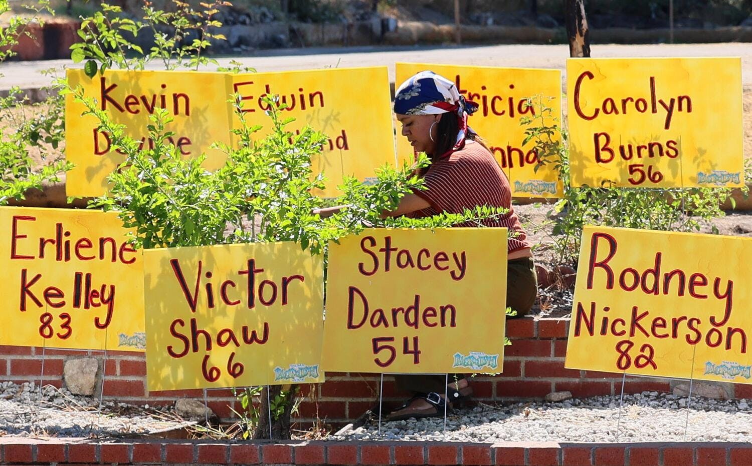 Rosalia Espino, whose multigenerational home organizes a memorial to fire victims her family created on their property.
