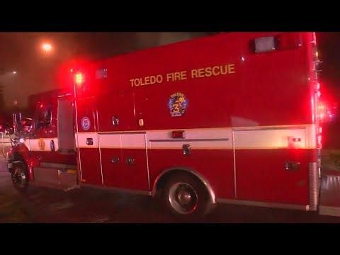 Two firefighters hospitalized after being hit by fallen debris in central Toledo blaze