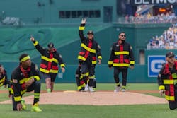 Head coach Valerie Perez, middle, recently retired as a firefighter from the Corpus Christi, TX, Fire Department after 10 years of service. Head coach Valerie Perez, middle, recently retired as a firefighter from the Corpus Christi, TX, Fire Department after 10 years of service.