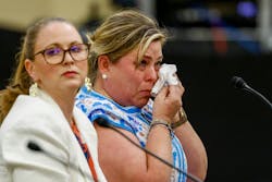 Alicia Jeffrey Baker wipes away tears after testifying about the loss of her 11-year-old daughter, Madelyn Emmy Jeffrey, and her parents, Emlyn and Penelope Jeffrey, during a joint hearing of the Texas Senate and House Select Committees on disaster preparedness and flooding. Alicia Jeffrey Baker wipes away tears after testifying about the loss of her 11-year-old daughter, Madelyn Emmy Jeffrey, and her parents, Emlyn and Penelope Jeffrey, during a joint hearing of the Texas Senate and House Select Committees on disaster preparedness and flooding.