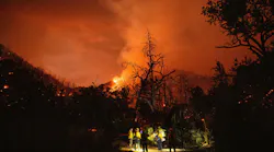 Firefighters prepare to move out as the Pickett fire burns in Calistoga, CA, late last week.