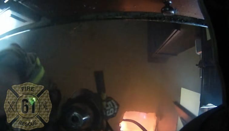 A Shrewsbury firefighters fell through the floor during an Aug. 3 building fire where two people died of gunshot wounds.