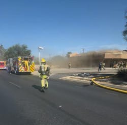 Left to right: When smoke volume increased and turned to dark brown, Noble issued an evacuation order for the interior crew. Moments after the crew exited the building, the smoke explosion occurred. Left to right: When smoke volume increased and turned to dark brown, Noble issued an evacuation order for the interior crew. Moments after the crew exited the building, the smoke explosion occurred.