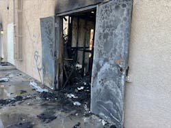 The fire originated in a storage room that only was accessible from the exterior. Because of this, members who entered the building through the front door—having seen smoke coming from the eaves—couldn’t locate the fire. The fire originated in a storage room that only was accessible from the exterior. Because of this, members who entered the building through the front door—having seen smoke coming from the eaves—couldn’t locate the fire.