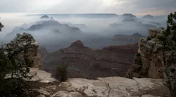Smoke from the Dragon Bravo fire settles into the Grand Canyon along the South Rim near Mather Point on July 17, 2025, in Grand Canyon, Arizona.