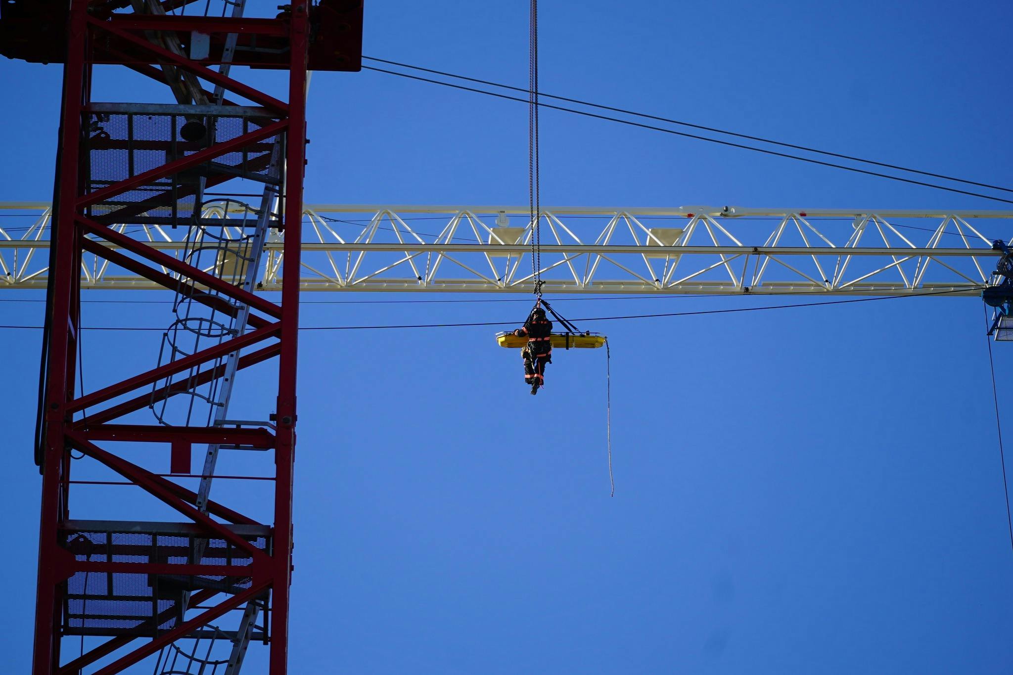 Tampa Firefighters Use Crane to Rescue Injured Work on High-Rise